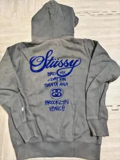 ステューシー stussy M チャンピオン コラボ グレー パーカーのサムネイル