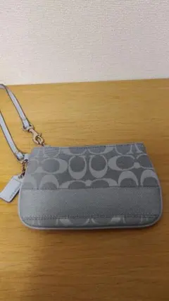 新品COACH ミニポーチ