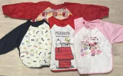 袖付き　お食事エプロン４枚セット（スヌーピー、ミニー&デイジー、りんご、蝶）