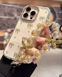 透明ビーズ ゴールドリボン スマホストラップ