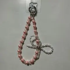 ピンクのパールリボンストラップ