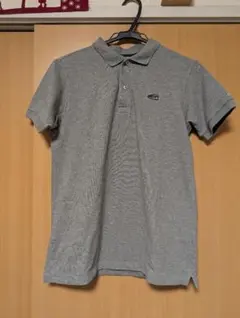 New Balance グレー ポロシャツ Sサイズのサムネイル
