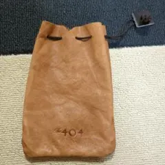 The 404 レザー巾着バッグ ブラウン　小物入れ？