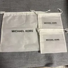 MICHAEL KORS 布製ポーチセット 大中小