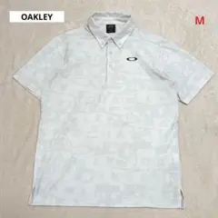 OAKLEY オークリー ゴルフウェア 半袖ポロシャツ ホワイト 総柄のサムネイル