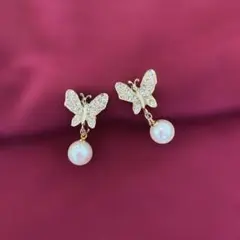 蝶々イヤリング ゴールド スワロフスキー 揺れるパール 華やか 結婚式 上品