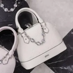 pium ピウム ビジュー付きモノグラムミニバッグ