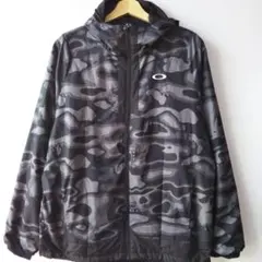 OAKLEY カモ柄 ウィンドブレーカー FOA401602 ブラック /XL