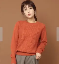 オレンジ ケーブルニット 長袖セーター