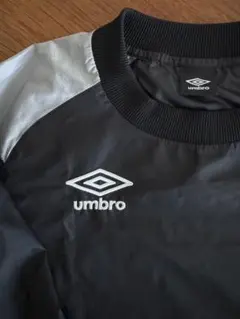 umbro 長袖ピステ・ウィンドブレーカー 黒・グレー
