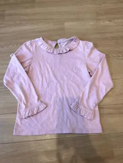 フリル付きピンク長袖シャツ
