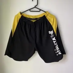 ATHLETA 黒/黄 ショートパンツ M