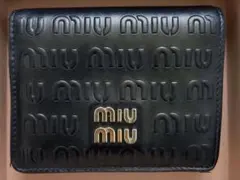 MIUMIU エンボスロゴレザー 二つ折り財布 SOFT CALF LOGO - メルカリ