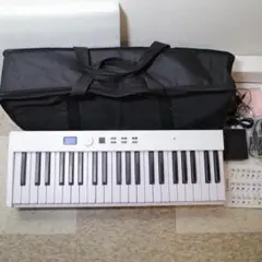 美品 CARINA 電子ピアノ 88鍵 折り畳み式 ホワイト 付属品多数のサムネイル