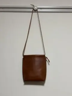 新品・未使用】URU Tokyo leather pouch オレンジ - メルカリ