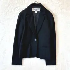 ナチュラルビューティーベーシック／テーラードジャケット S ウール 無地 黒