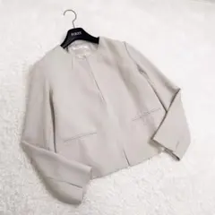 ナチュラルビューティーベーシック　ノーカラージャケット　ベージュ