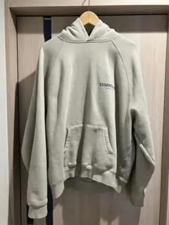 ESSENTIALS ベージュ フード付きパーカー Lサイズのサムネイル