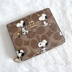 コーチ　スヌーピー　コラボ　二つ折り財布　PEANUTS シグネチャー 極美品