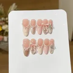韓国ネイル ピンクベージュ リボン×パール 量産型ガーリー　春ネイル