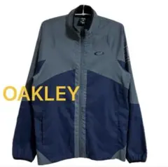 OAKLEY ウインドブレーカー（メンズ Lサイズ）裏地なし　グレー×ネイビー