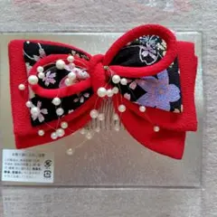 赤いリボン型髪飾り