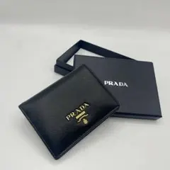 ♡美品♡PRADA プラダ 二つ折り財布 サフィアーノレザー 三角ロゴ ブラック 楽天市場】極美品 プラダ PRADA 三角ロゴ Wホックファスナー付き 二