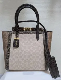 COACH コーチ シグネチャー シャンブレー Hutton - メルカリ