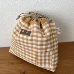 ギンガムチェックリネンの巾着バック　 ハンドメイド　外ポケット　刺し子タグ