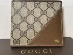 【新品未使用】GUCCI GGスプリーム 二つ折り財布　イタリア製のサムネイル