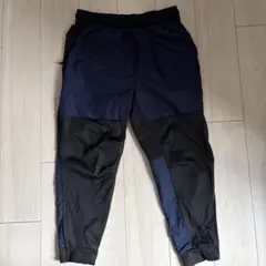 ナイキ　パンツ　レペルアンリミテッドテーパードレッグバーサタイルパンツ