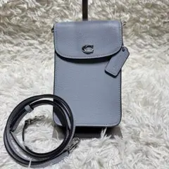 コーチ　スマホショルダー フォーン　クロスボディ　レザー　ライトブルー