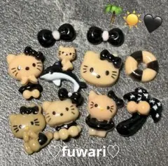 《日焼けハローキティ》黒　ギャル　ネイルパーツ　まとめ買い値引きあり♡サンリオのサムネイル