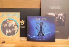yellow studs イエロースタッズ black letter - メルカリ