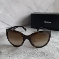 PRADA ブラウン✖️ワインカラーサングラス ケース付き - メルカリ