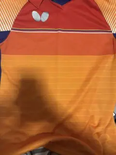 卓球ウェア オレンジ/赤/青 バタフライ