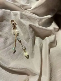 リボンとハートのストラップ