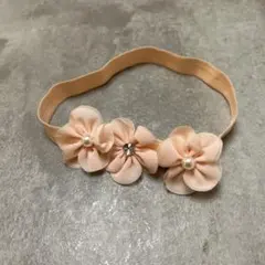 花飾り付きピンクヘアバンド