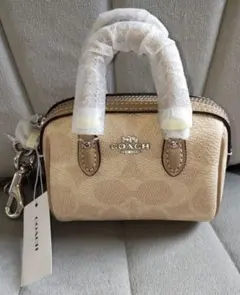 『新品』ミニ ローアン バッグ チャーム・シグネチャー キャンバス・ラベル付