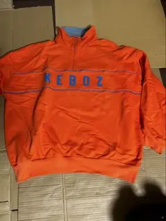 KEBOZ ハーフジップスウェット オレンジ Lのサムネイル