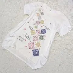 ピノーレ プランティカ PINORE 半袖Tシャツ 白 40(L) ゆったり花のサムネイル