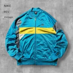 2740古着80年代NIKEトラックジャケット刺繍ロゴ好配色マルチカラー紺タグL