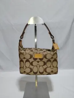 美品✨ コーチ スタッズ ダークブラウン ラメ アクセサリーポーチ 
