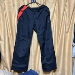 レディース　Nike ナイロンパンツ 黒 Sサイズ 足首あたりに小さな￼穴スレ有