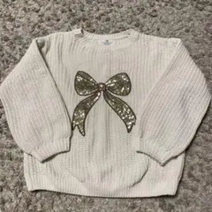アイボリー ニットセーター リボンモチーフ