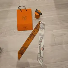 HERMES オレンジ シルク バンダナ タイ - メルカリ