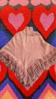 フリンジ付きタートルネックポンチョ ピンク