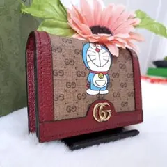 GUCCI ドラえもん 二つ折り財布 GGスプリーム レッド - メルカリ