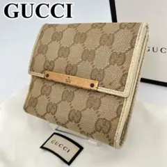 GUCCI 二つ折り財GGキャンバス ゴールド金具 アイボリー 112664
