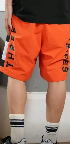 adidas ショートパンツ オレンジ